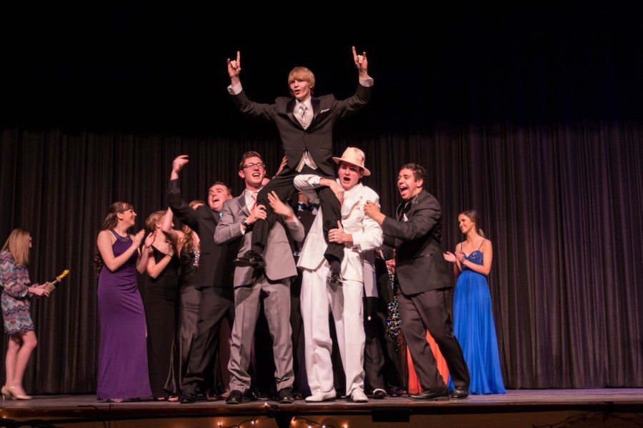 Andrew Van Steenbergen is raised by his fellow contestants after being crowned 2015 Mr. Coginchaug.