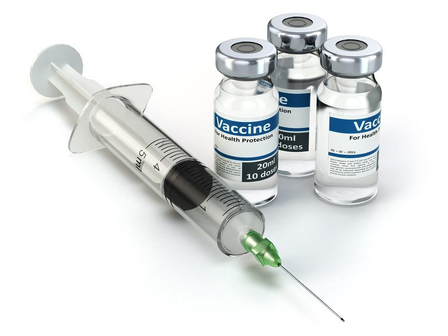 Vaccine+in+vial+with+syringe.+Vaccination+concept.++3d