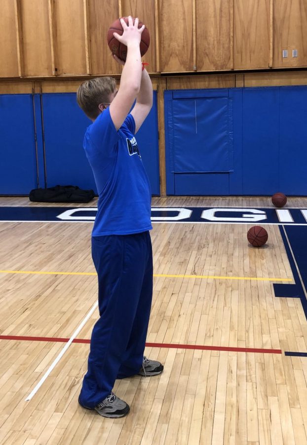 CRHS Unified student Zach Ryer shoots around during his Unified Sports class.