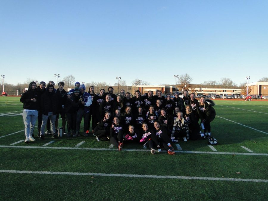 The+Class+of+2022+Powderpuff+team+with+their+coaches+after+beating+the+Juniors+22-0.+%28Photo%3A+Zach+Infeld%29